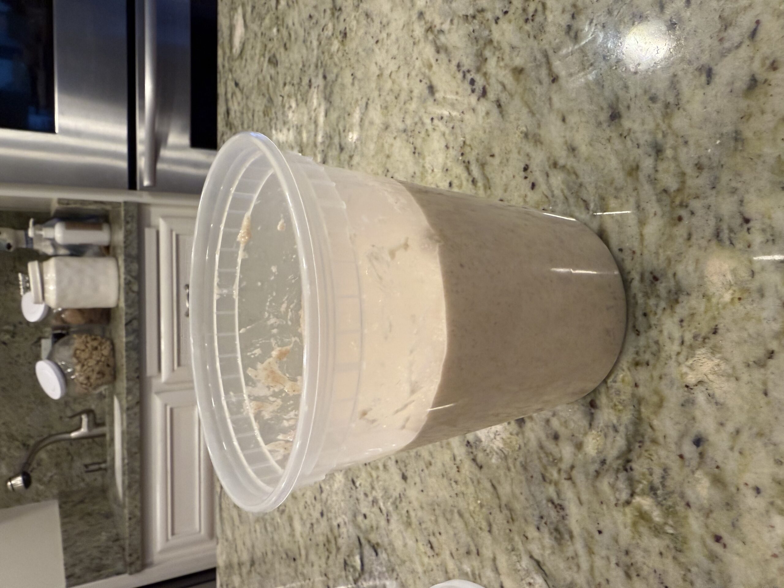 Poolish has risen 2.5x in a tall clear deli container