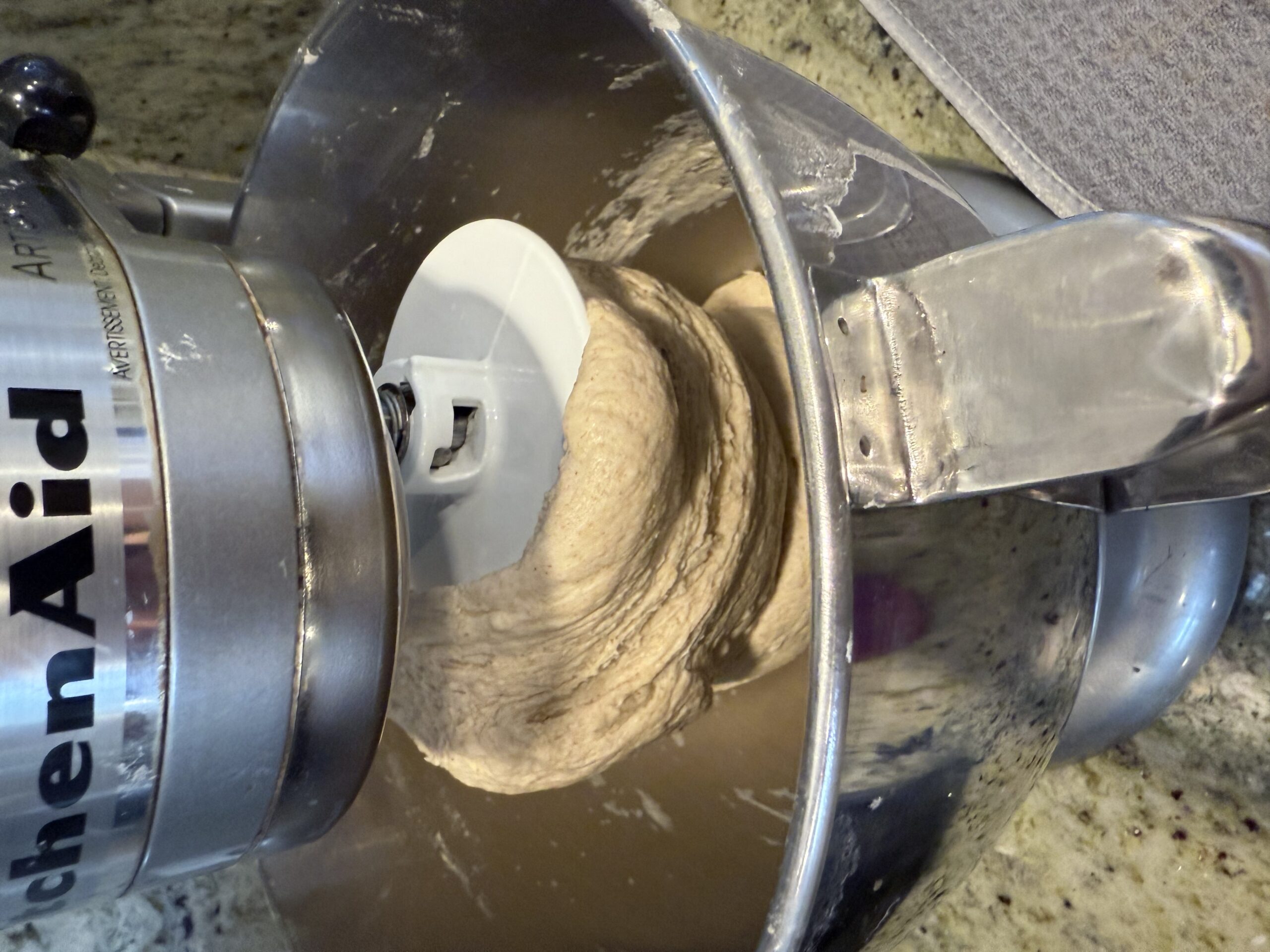 Dough wrapping up around the KitchenAid dough hook